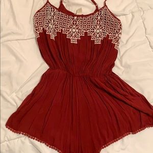 red embroidered romper
